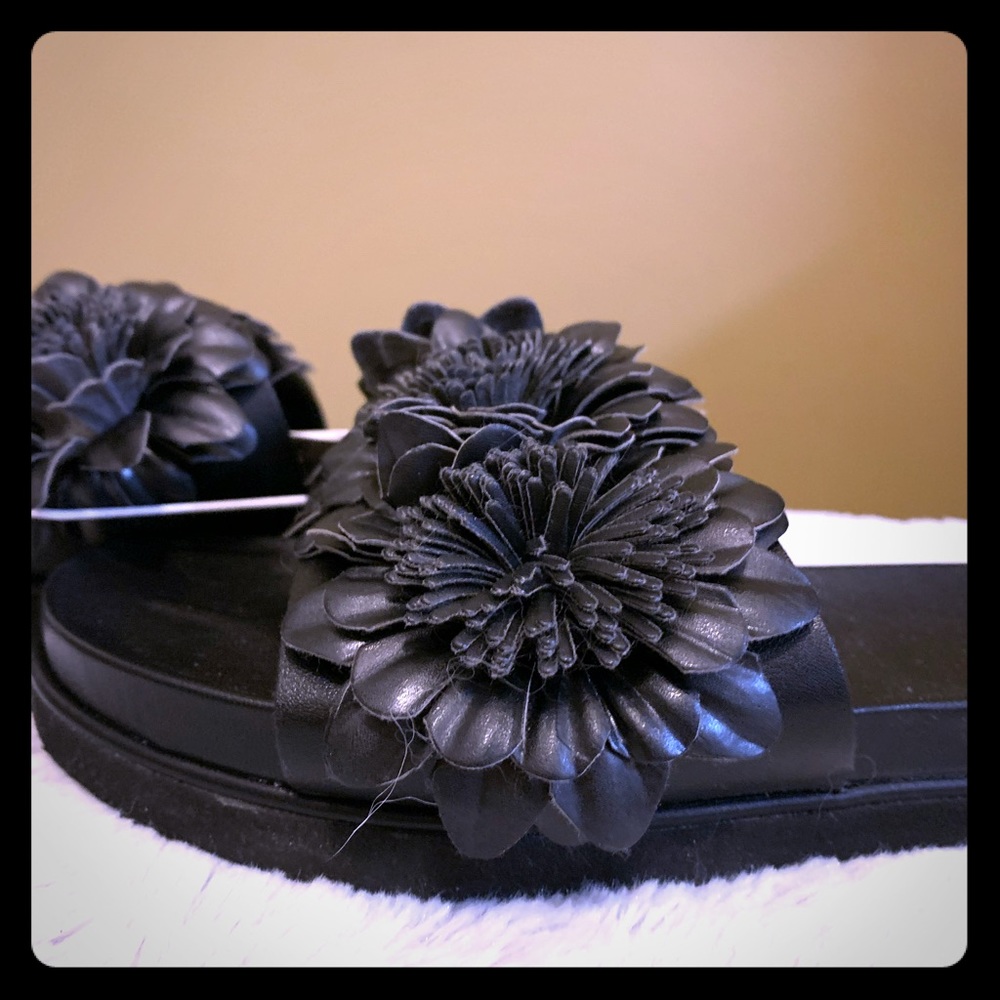 Black poofy floral slides